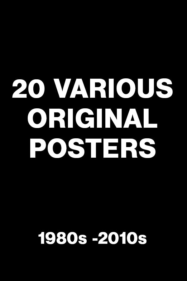 Close-up of vintage original movie posters with minor creases and edge wear, perfect for collectors.
