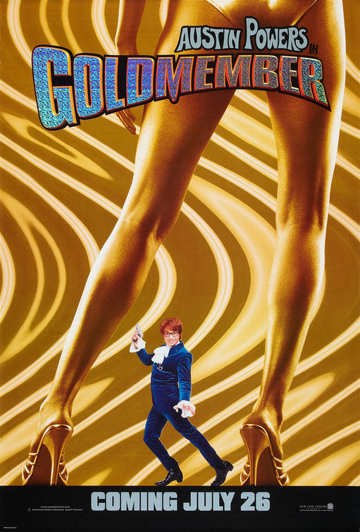 Close-up of the Austin Powers Goldmember glitter collectible in packaging, perfect movie merchandise for fans
