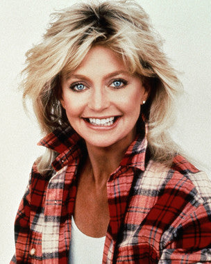 Goldie Hawn signed memorabilia showcasing her signature and vintage photo