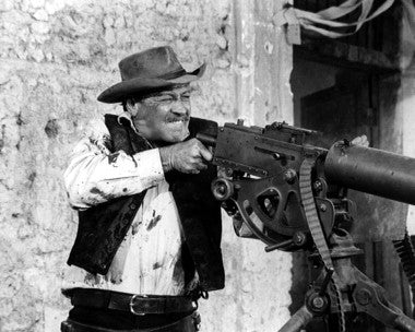 William Holden's Wild Bunch movie scene highlighting vintage Western style