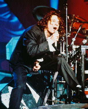 Michael Hutchence autographed photo with vibrant colors, perfect for display