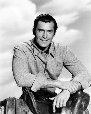 Clint Walker signed photo showcasing his iconic role in classic film