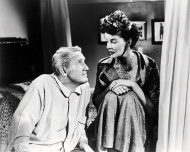 Pat and Mike DVD cover showcasing Katharine Hepburn and Spencer Tracy in a comedic scene