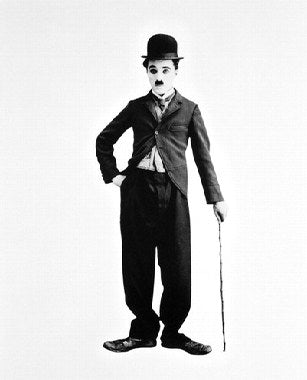 Vintage Charlie Chaplin poster showcasing his iconic character.