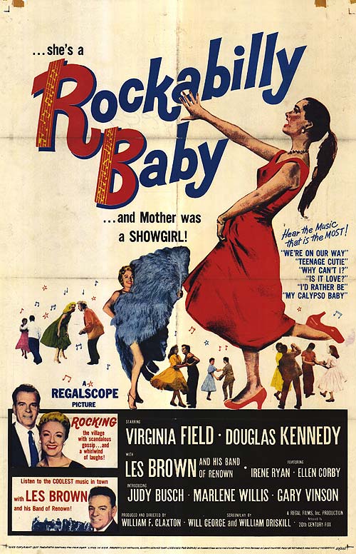 Baby girl in vintage rockabilly dress playing on a blanket