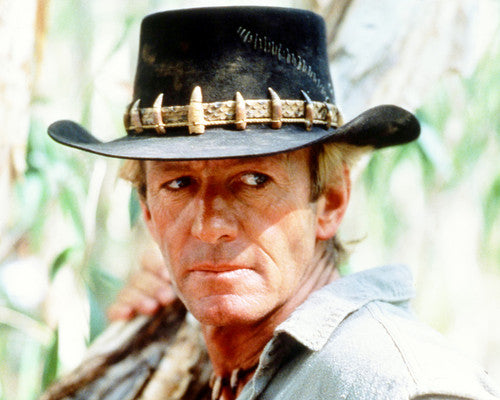 Hiker wearing Crocodile Dundee outdoor clothing on mountain trail