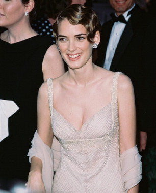 Model showcasing a Winona Ryder-inspired vintage dress for summer
