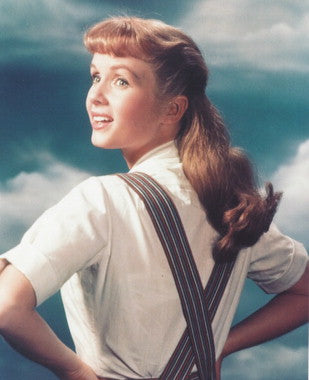 Debbie Reynolds vintage movie poster showcasing her iconic role.