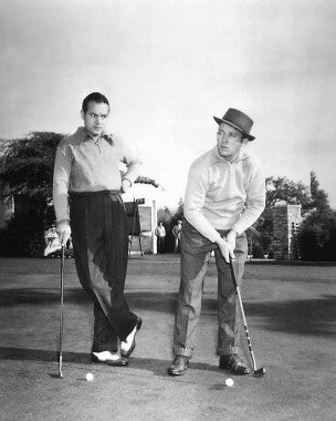 Close-up of Road to Singapore DVD cover featuring Bing Crosby and Bob Hope in vibrant tropical artwork