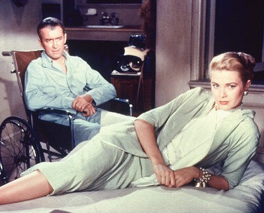 Close-up of Grace Kelly in Rear Window scene printed on vintage movie poster