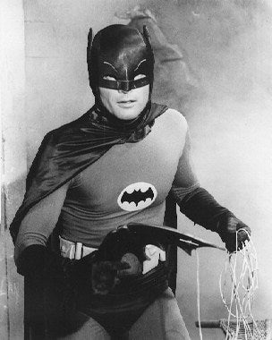 Close-up of a vintage Batman Adam West figure showcasing intricate details.