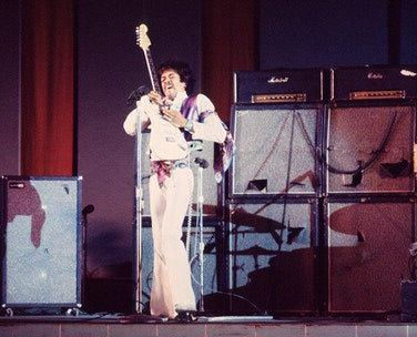 Jimi Hendrix vinyl record collection on a turntable, perfect for rock music fans