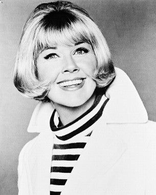 Doris Day performing live, showcasing her iconic style and charm.
