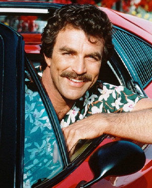 Magnum P.I. DVD box set showcasing Tom Selleck's character in action.