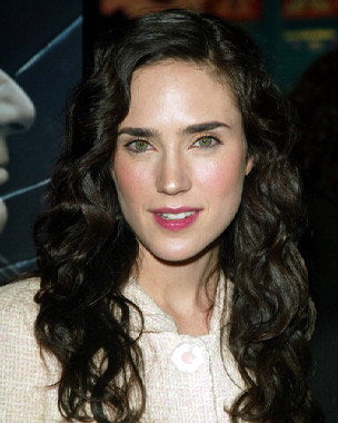 Jennifer Connelly applying moisturizer in her skincare routine