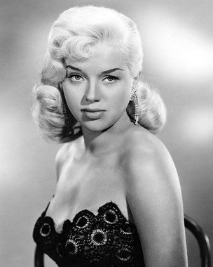 Model wearing a vintage Hollywood fashion dress inspired by Diana Dors, front view