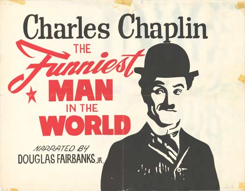 World's funniest man poster on a living room wall, adding humor to the decor.