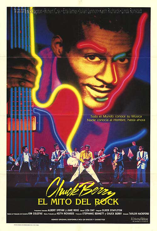 Framed Chuck Berry Hail Hail Rock and Roll print hanging in a retro-style living room