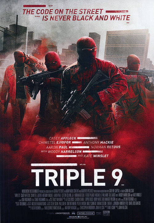 Applying Triple 9 wrinkle repair spray to clothing to fix minor creases