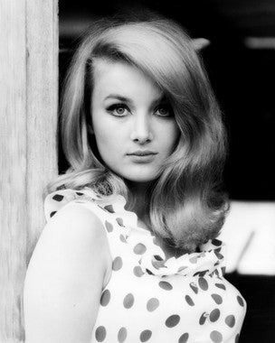 Close-up of Barbara Bouchet Radiant Glow Skin Care products with vibrant background.