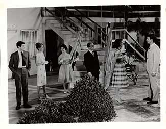 A scene from Where the Boys Are showing the main characters enjoying a beach party.