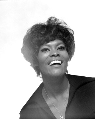 Dionne Warwick vinyl records collection on a vintage shelf