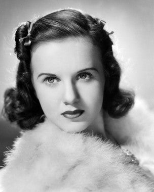 Deanna Durbin movie collection showcasing iconic films and albums.