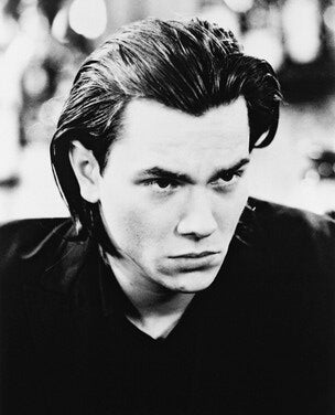Front view of a River Phoenix vintage shirt showcasing retro fashion.