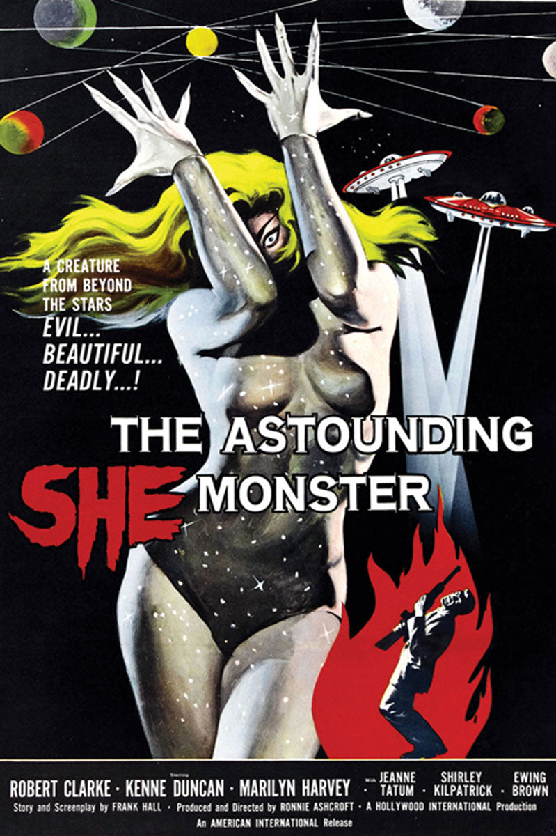 Framed Astounding She-Monster giclee print hanging in a retro-themed living room