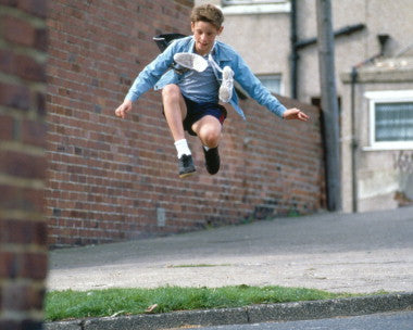 Front cover of Billy Elliot DVD featuring Jamie Bell in a ballet pose