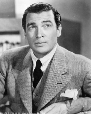 Walter Pidgeon in a classic film scene showcasing his iconic acting style.