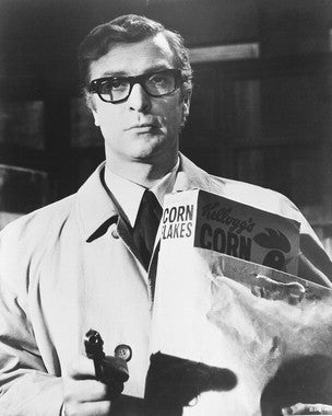 A scene from The Ipcress File highlighting Michael Caine in a dramatic moment.