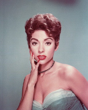 Rita Moreno in a classic film role showcasing her talent