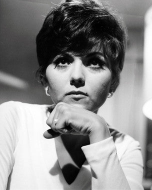 Close-up of Brenda Vaccaro skincare products highlighting glowing skin benefits.