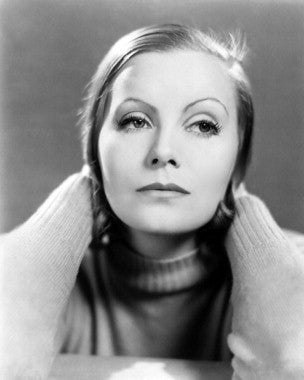 Close-up of Greta Garbo perfume bottle with vintage design