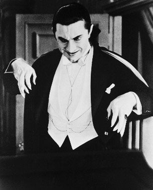 Front angle of Bela Lugosi Dracula figure in iconic cape pose, part of vampire movie collectibles line.