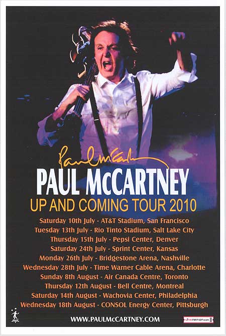 Paul McCartney performing live on stage, showcasing his iconic music during the concert.