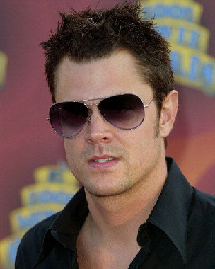 Johnny Knoxville t-shirt displayed on a mannequin, showcasing its vibrant design and comfortable fit.
