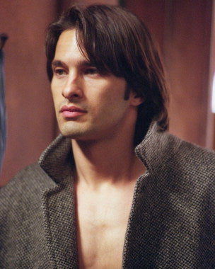 Olivier Martinez designer necklace styled with evening wear