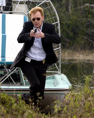Men's outfit inspired by David Caruso, showcasing a stylish blazer and jeans.