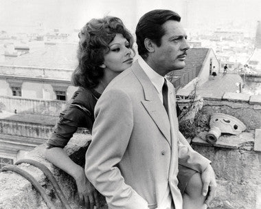 Sophia Loren and Marcello Mastroianni in a romantic scene from Italian cinema.