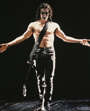 Close-up of Brandon Lee The Crow poster with vivid colors and detailed artwork