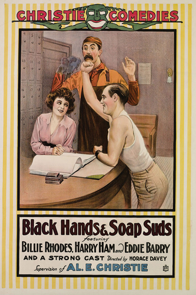 Black hands and soap suds art print hanging in a modern living room