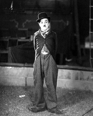 Authentic Charlie Chaplin signed photo displayed elegantly.