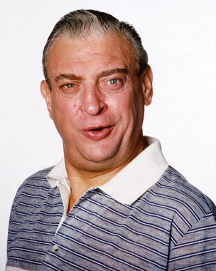 Rodney Dangerfield stand-up DVD collection on a shelf with classic comedy posters