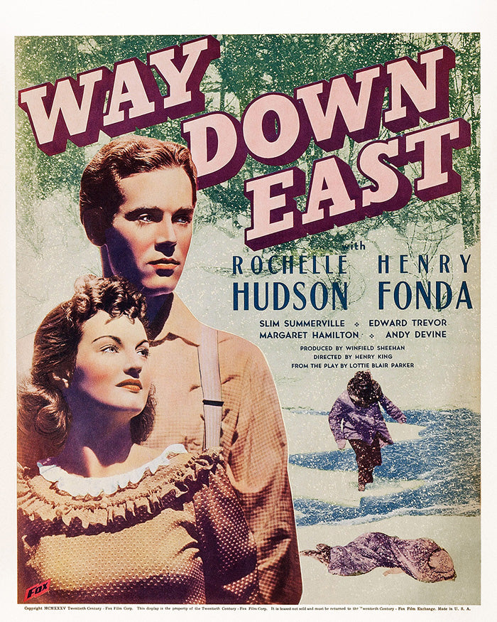 View of the 'Way Down East' art print hanging above a sofa in a contemporary living room