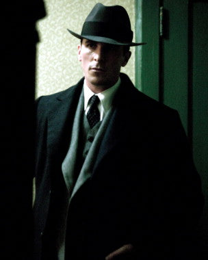 Close-up of a Christian Bale autograph on a collectible photo.
