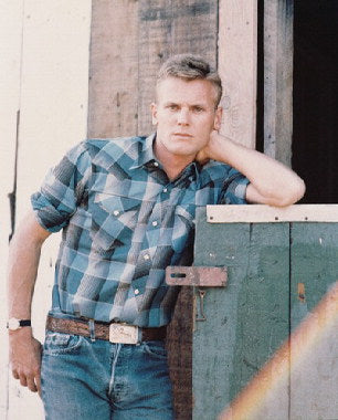 Close-up of Tab Hunter smart watch displaying heart rate data during workout