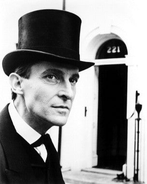 Jeremy Brett signed autograph displayed in a frame, showcasing his iconic role as Sherlock Holmes.