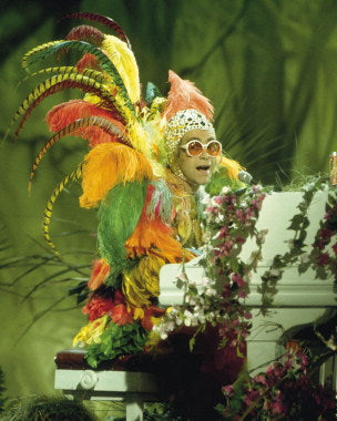 Elton John concert poster for sale showcasing colorful artwork.